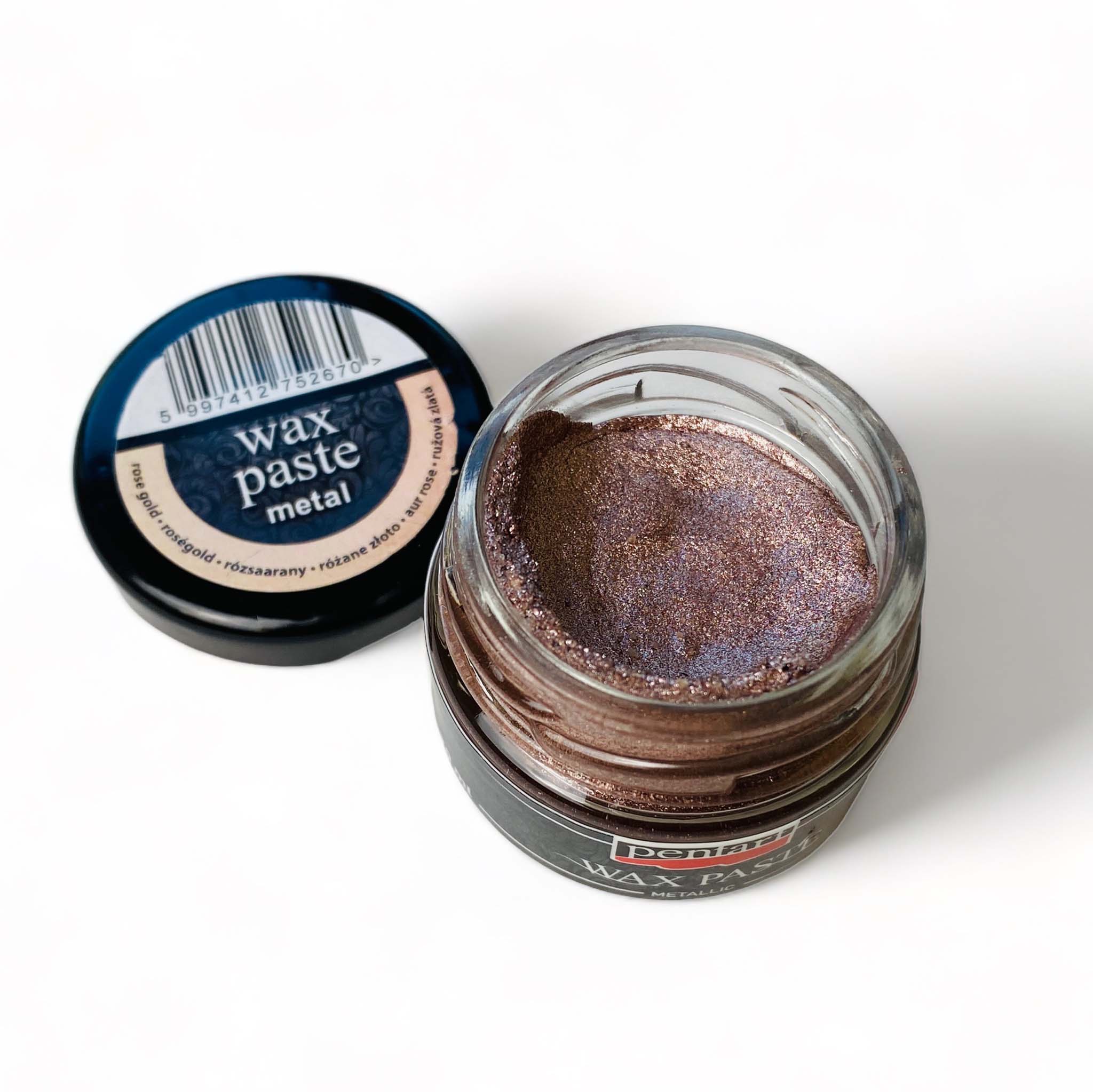 An open jar of a 20ml/0.68 ounce jar of metallic Rose Gold Wax Paste by Pentart is against a white background.