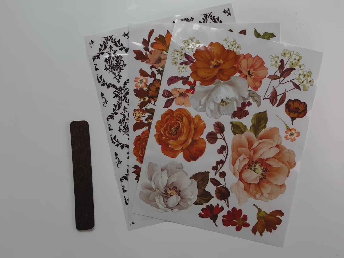 A 14 second video shows a close-up of 3 sheets of ReDesign with Prima's Classic Peach middy transfer.