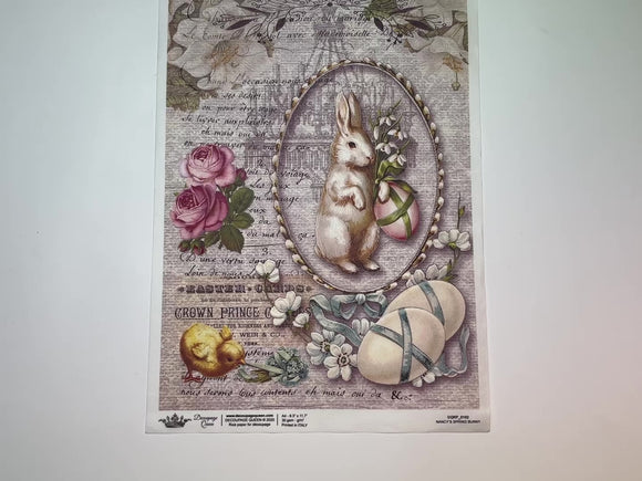 A 12 second video shows a close-up and backside of Decoupage Queen's Nancy's Spring Bunny rice paper against a white background.