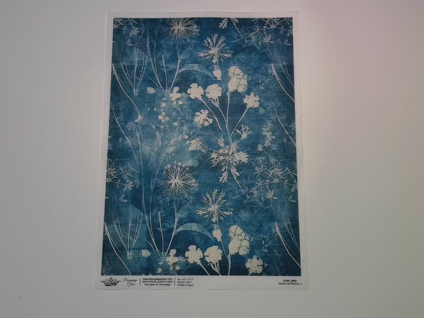 A 14 second video shows a close-up and backside of Decoupage Queen's Indigo Botanical 3 A4 rice paper.