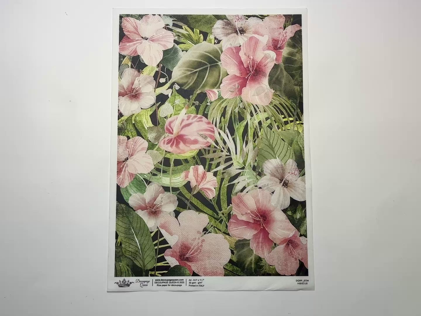 A 13 second video shows a close-up and backside of Decoupage Queen's Hibiscus A4 rice paper against a white background.