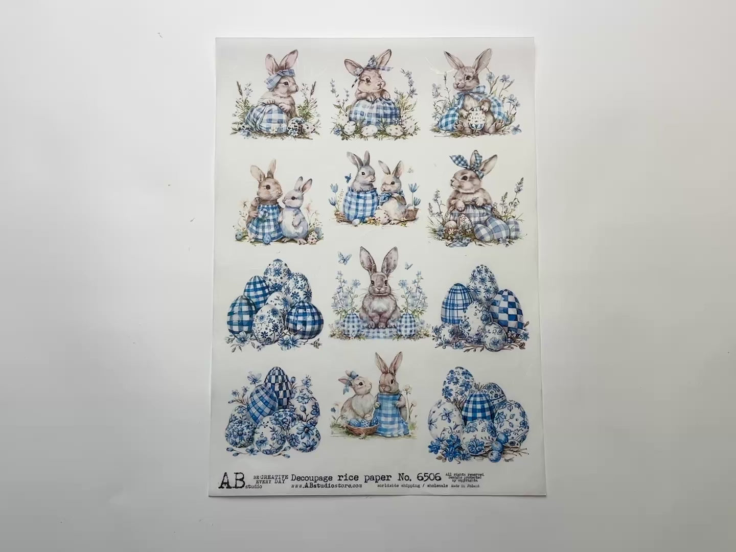 A 15 second video shows a close-up and backside of AB Studio's Blue Plaid Bunny Die Cuts A4 rice paper against a white background.