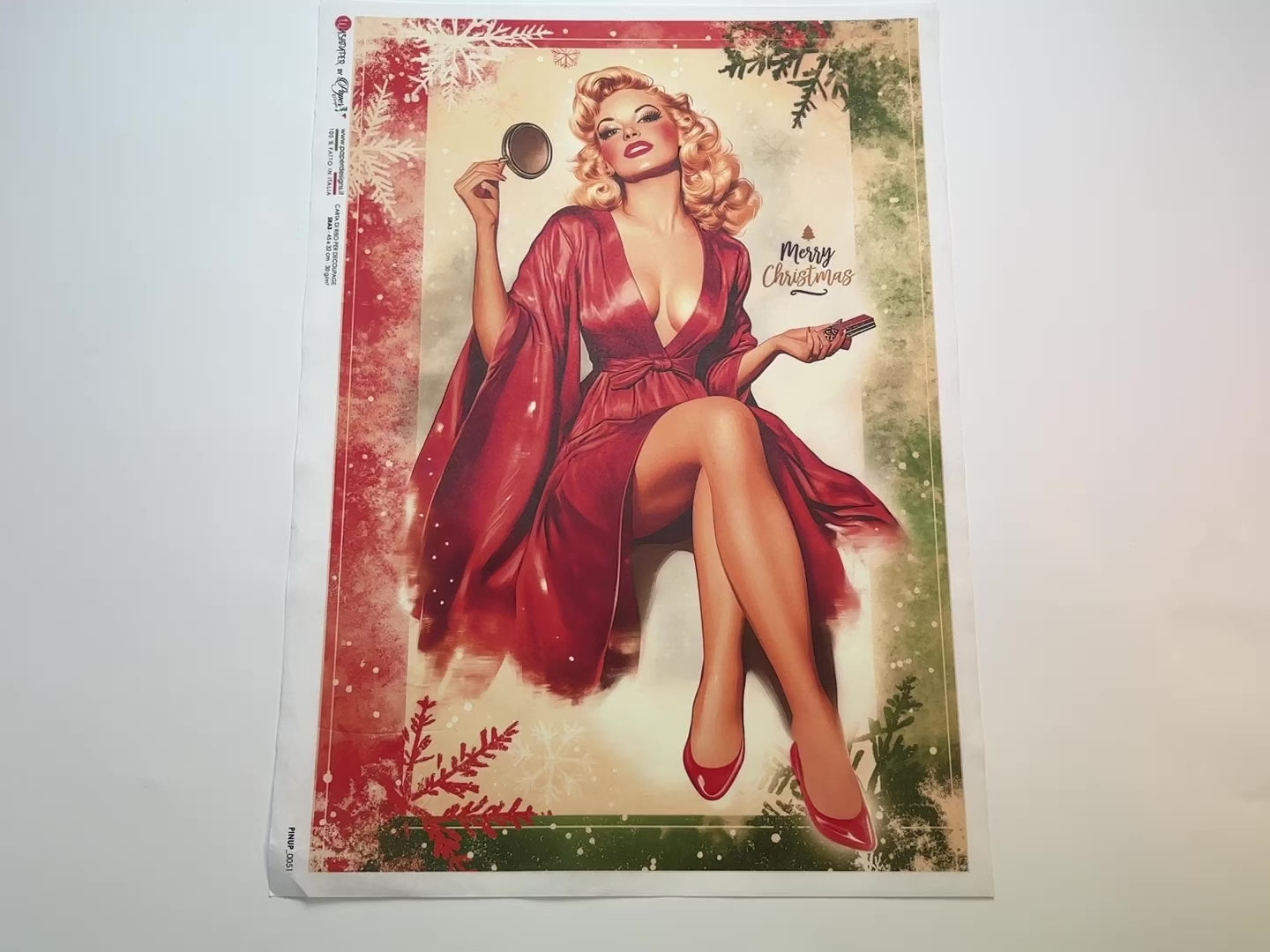 A 13 second video shows a close-up and backside of Paper Designs Italy's Classic Christmas Pinup A3 rice paper against a white background.