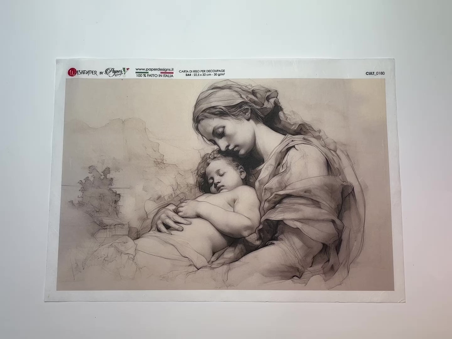 An 11 second video of a close-up and backside of Paper Designs Italy's Mary and Child A4 rice paper is against a white background.