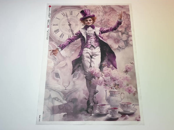 A 14 second video of a close-up and backside of Decoupage Queen's Mad Hatter Tales A3 rice paper is against a white background.
