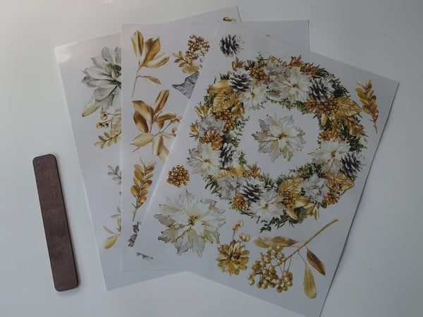 A 14 second video shows a close-up of 3 sheets of ReDesign with Prima's A Gilded Moment small rub-on transfer.