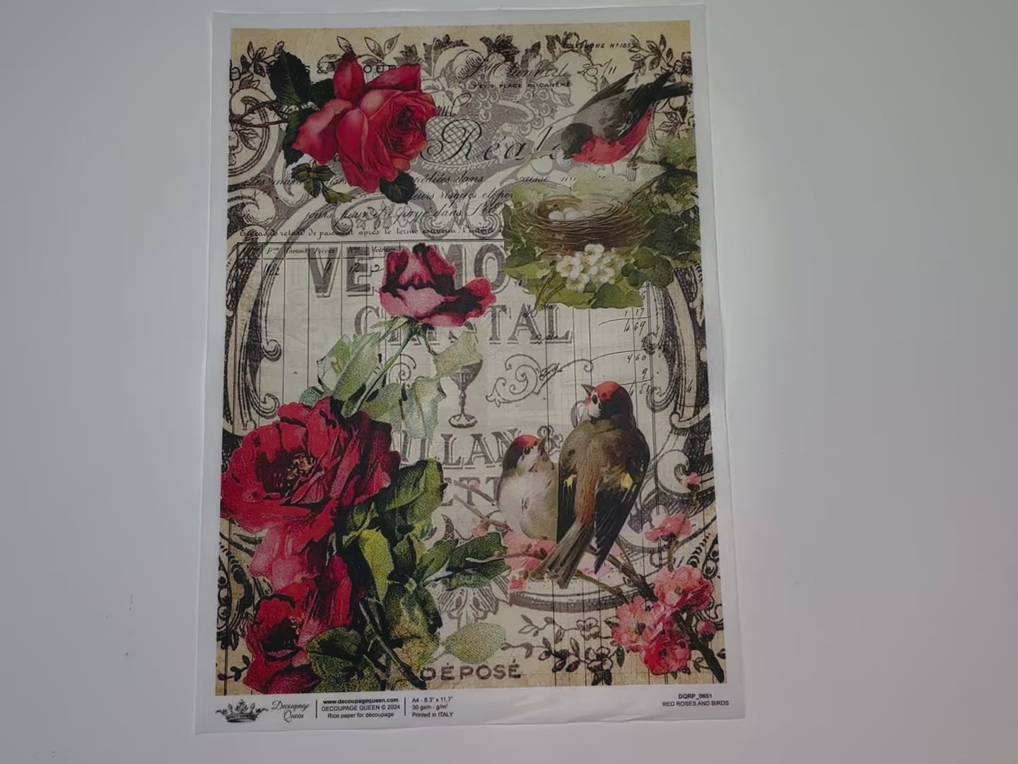 A 14 second video shows a close-up and backside of Decoupage Queen's Red Roses and Birds A4 rice paper.