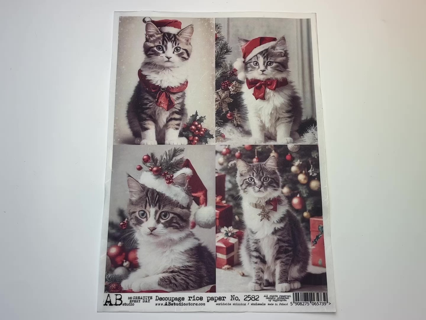 A 14 second video showing a close-up and backside of AB Studio's Four Christmas Kittens A4 rice decoupage paper is against a white background.