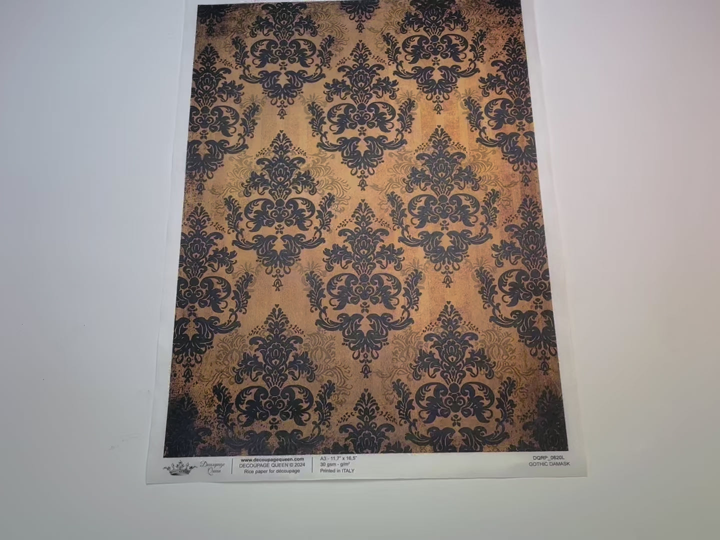 A 15 second video shows a close-up and backside of Decoupage Queen's Gothic Damask A3 rice paper.