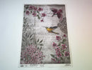 A 14 second video shows a close-up and backside of Decoupage Queen's Hummingbird Song A3 rice paper against a white background.