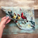 A 13 second video shows close-ups of 3 sheets of ReDesign with Prima's Christmas in the Countryside A3 fiber papers against a wood background.