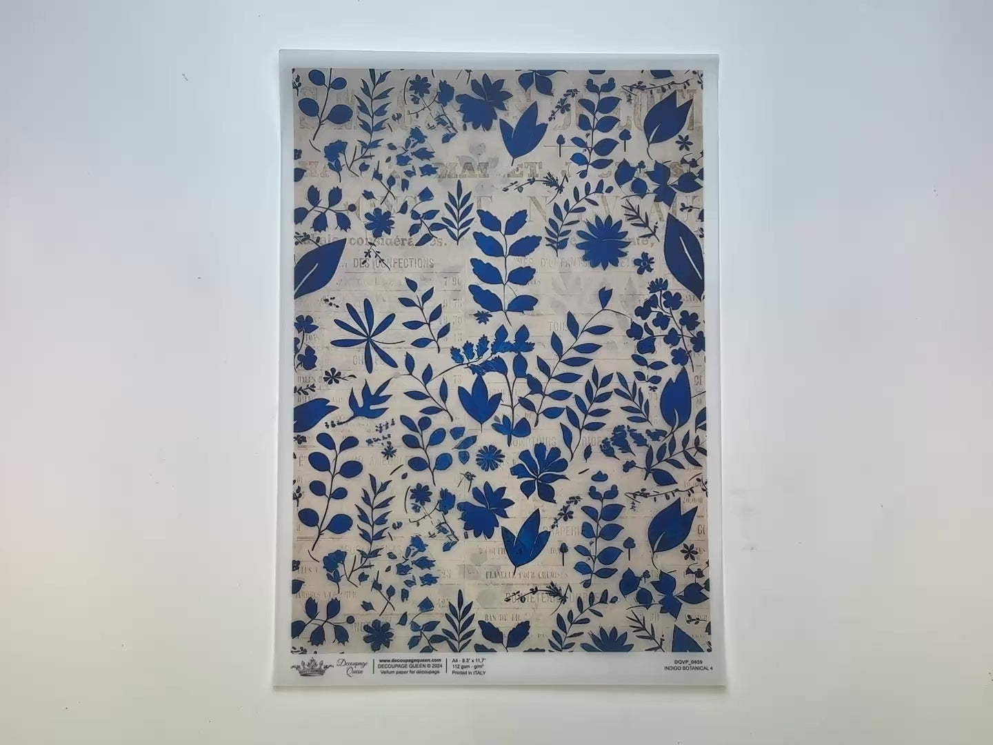 A 13 second video shows a close-up and backside of Decoupage Queen's Indigo Botanical 4 A4 vellum decoupage paper against a white background.