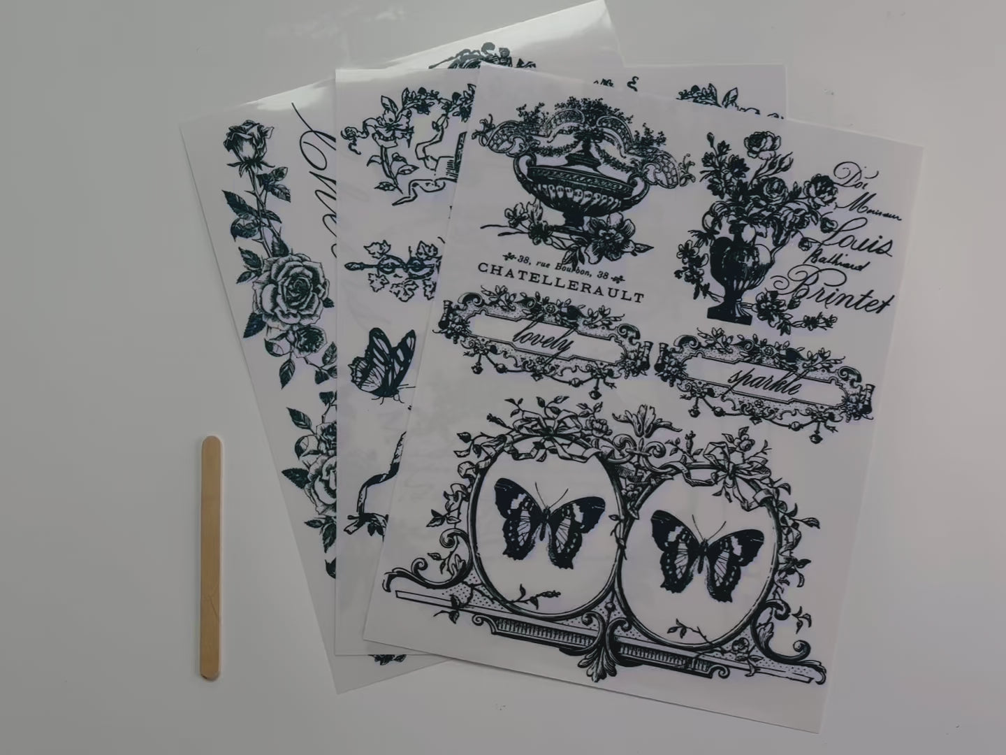 A 14 second video shows a close-up of 3 sheets of ReDesign with Prima's Lovely Labels middy transfer.