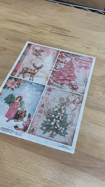 A 17 second video shows examples of Decoupage Queen's 2025 Christmas rice papers against a wood table.