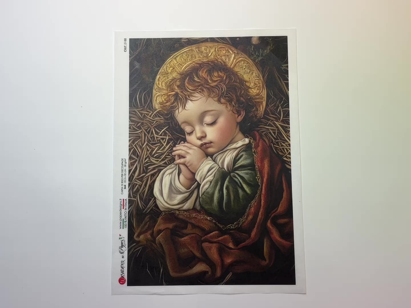 A 13 second video shows a close-up and backside of Paper Designs Italy's Sleeping Baby Jesus A4 rice paper against a white background.