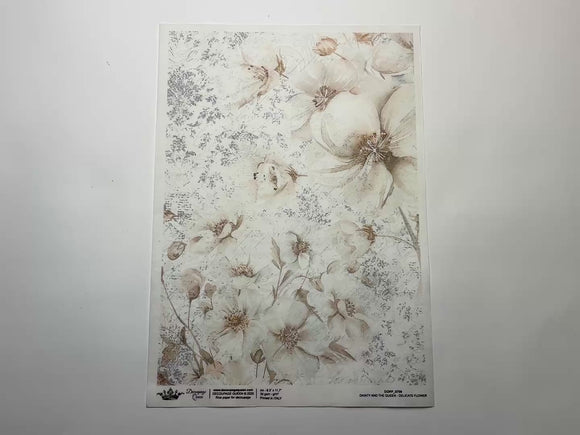 A 14 second video shows a close-up and backside of Decoupage Queen's Delicate Flower A4 rice paper against a white background.