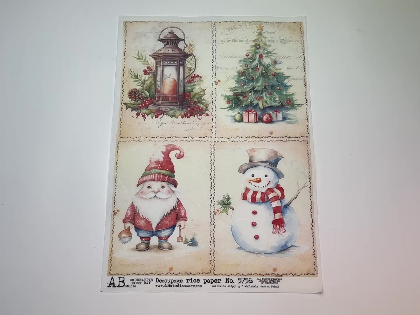 A 14 second video showing a close-up and backside of AB Studio's Christmas Whimsy 4 Pack A4 rice decoupage paper is against a white background.