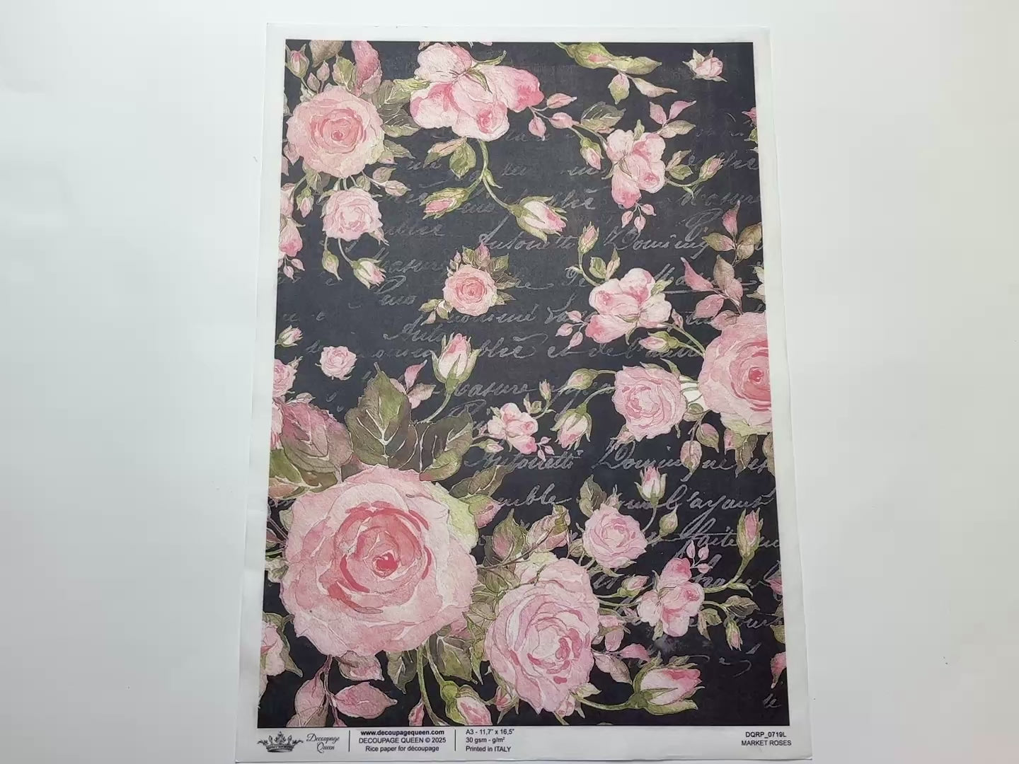 A 14 second video shows a close-up and backside of Decoupage Queen's Market Roses A3 rice paper against a white background.