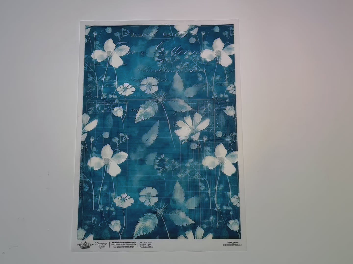 A 14 second video shows a close-up and backside of Decoupage Queen's Indigo Botanical 1 A4 rice paper.