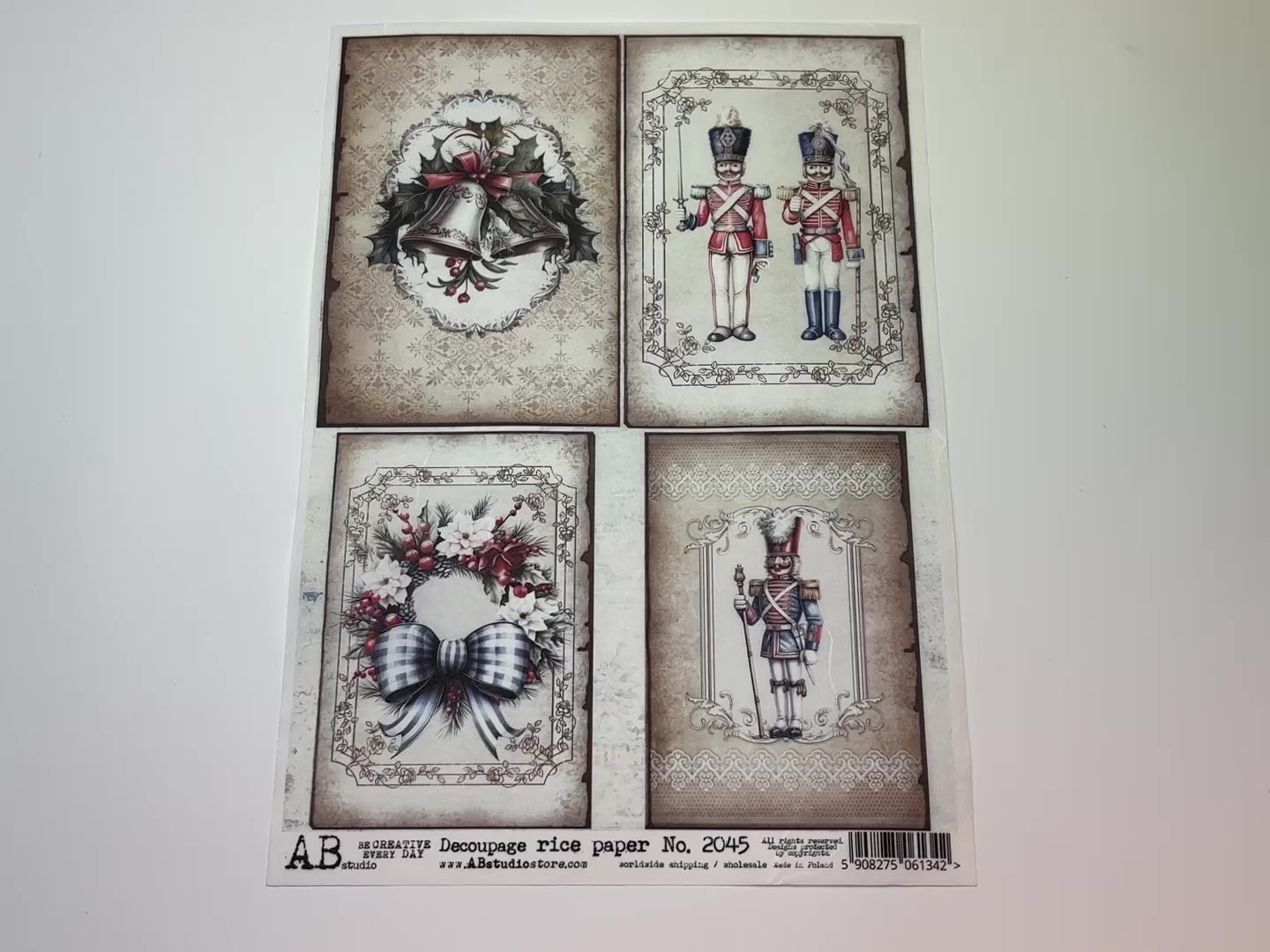 A 14 second video shows a close-up  and backside of AB Studio's Nutcracker and Holiday Bells A4 rice paper against a white background.