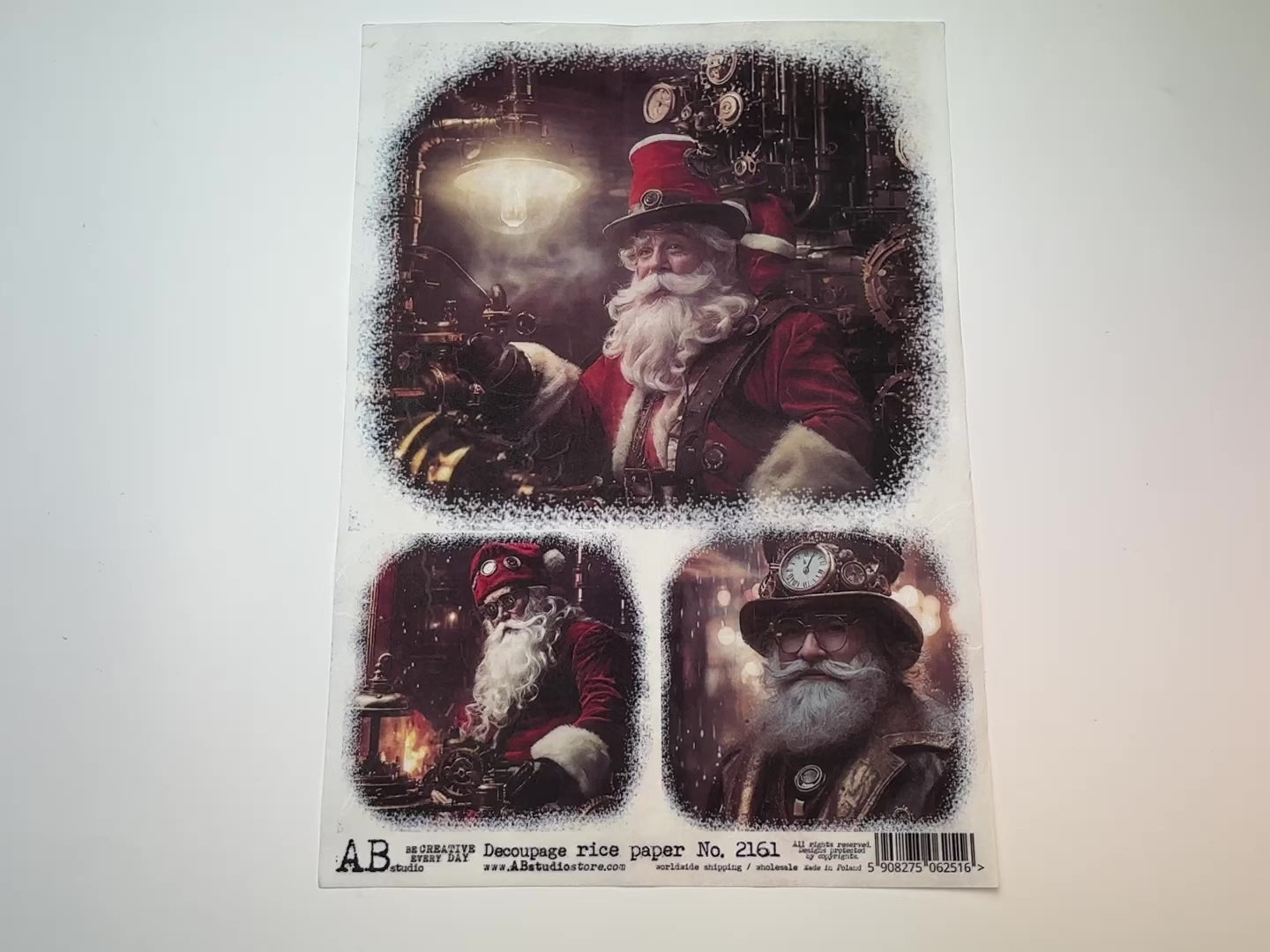 A 12 second video shows a close-up and backside of AB Studio's Steampunk Santas A4 rice paper against a white background.