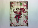 A 13 second video shows a close-up and backside of Decoupage Queen's Happy Santa A4 rice paper against a white background.