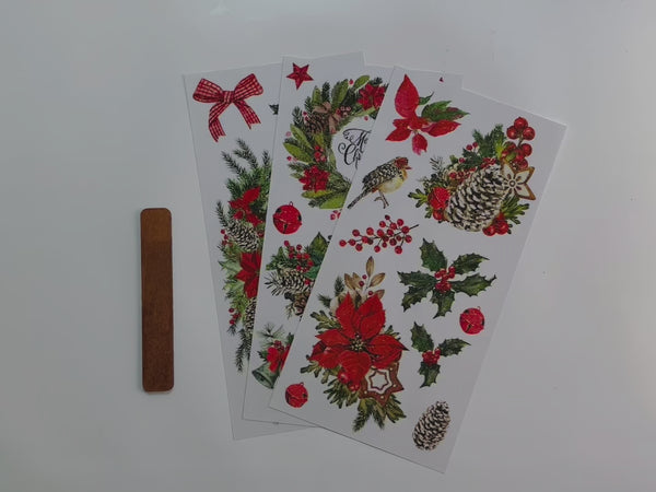 A 15 second video shows a close-up of 3 sheets of ReDesign with Prima's Classic Christmas small rub-on transfer.