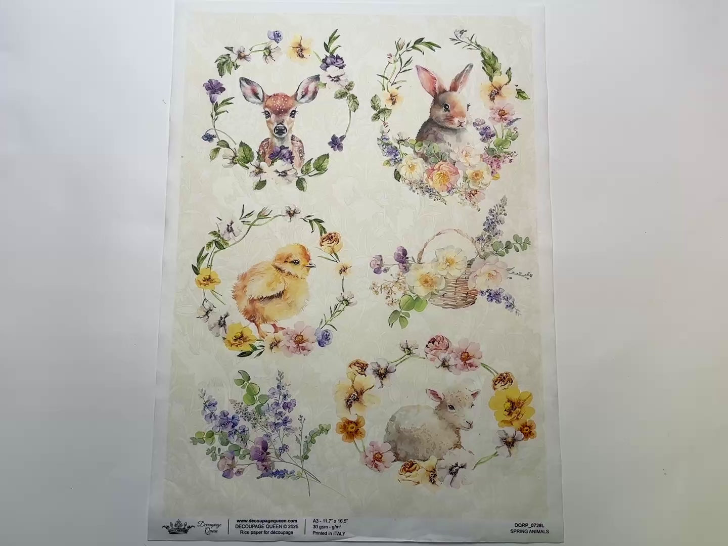 A 14 second video shows a close-up and backside of Decoupage Queen's Spring Animals A3 rice paper against a white background.