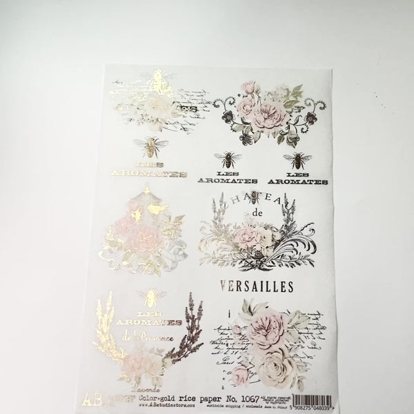 A 14 second video shows a close-up and a hand lifting and flipping over AB Studio's Gilded Pink Rose French Labels A4 rice against a white background.
