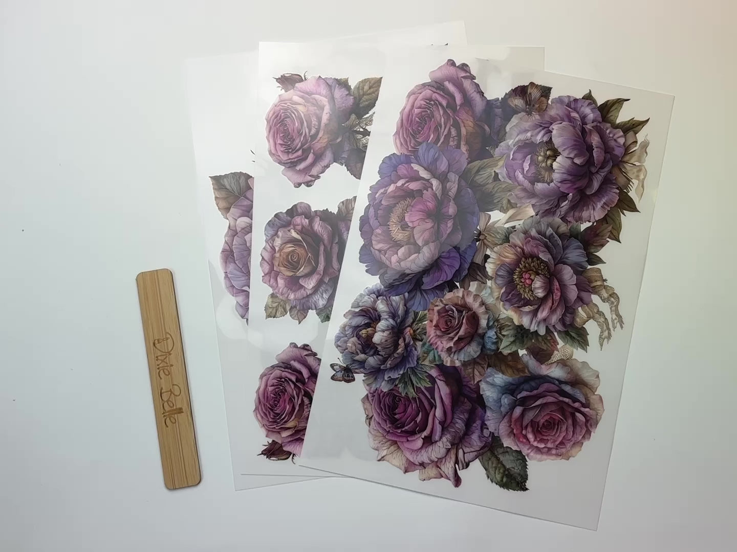 A 14 second video shows a close-up of 3 sheets of Belles & Whistles' Roses and Peonies rub-on transfer.