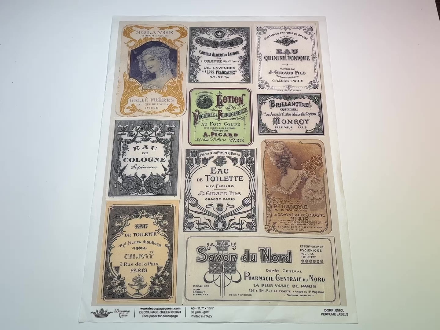 A 15 second video of a close-up and backside of Decoupage Queen's Perfume Labels A3 rice paper is against a white background.
