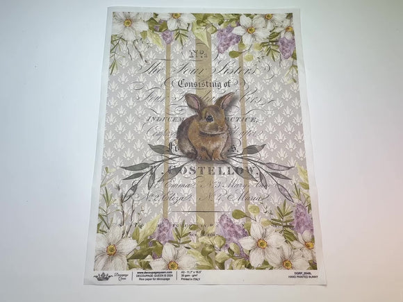 A 13 second video of a close-up and backside of Decoupage Queen's Hand Painted Bunny A3 rice paper is against a white background.
