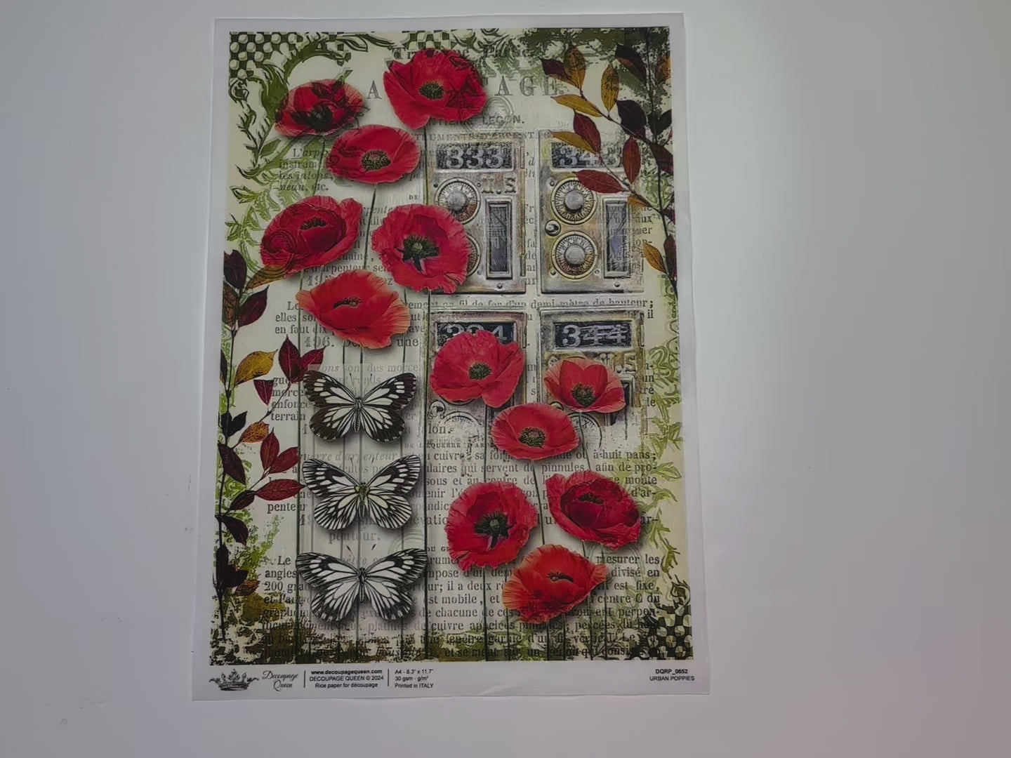 A 14 second video shows a close-up and backside of Decoupage Queen's Urban Poppies A4 rice paper.