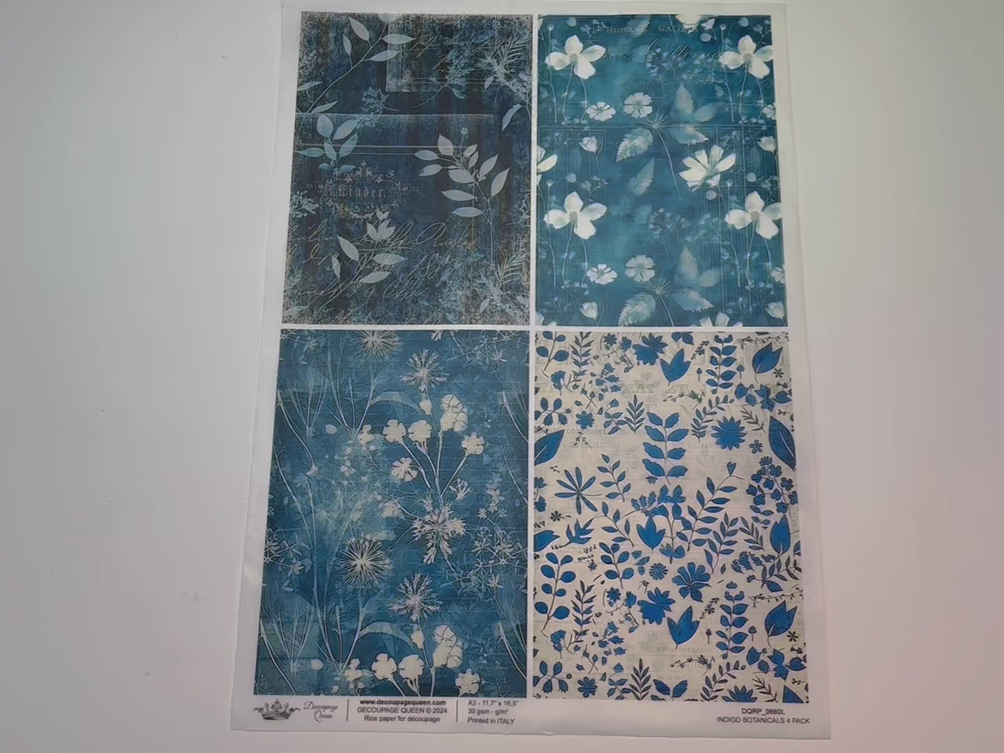 A 15 second video shows a close-up and backside of Decoupage Queen's Indigo Botanicals 4 Pack A3 rice paper.