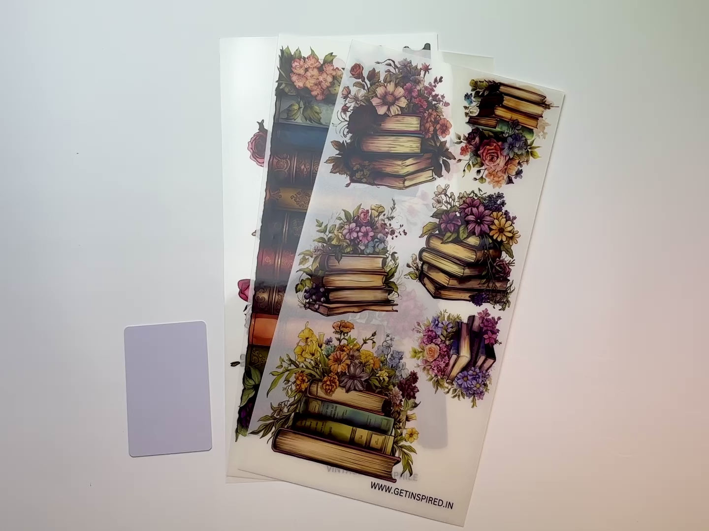 A 15 second video shows a close-up and backside of 3 sheets of Dadarkar Art's Get Inspired Vintage Bibliophile rub-on transfers against a white background.