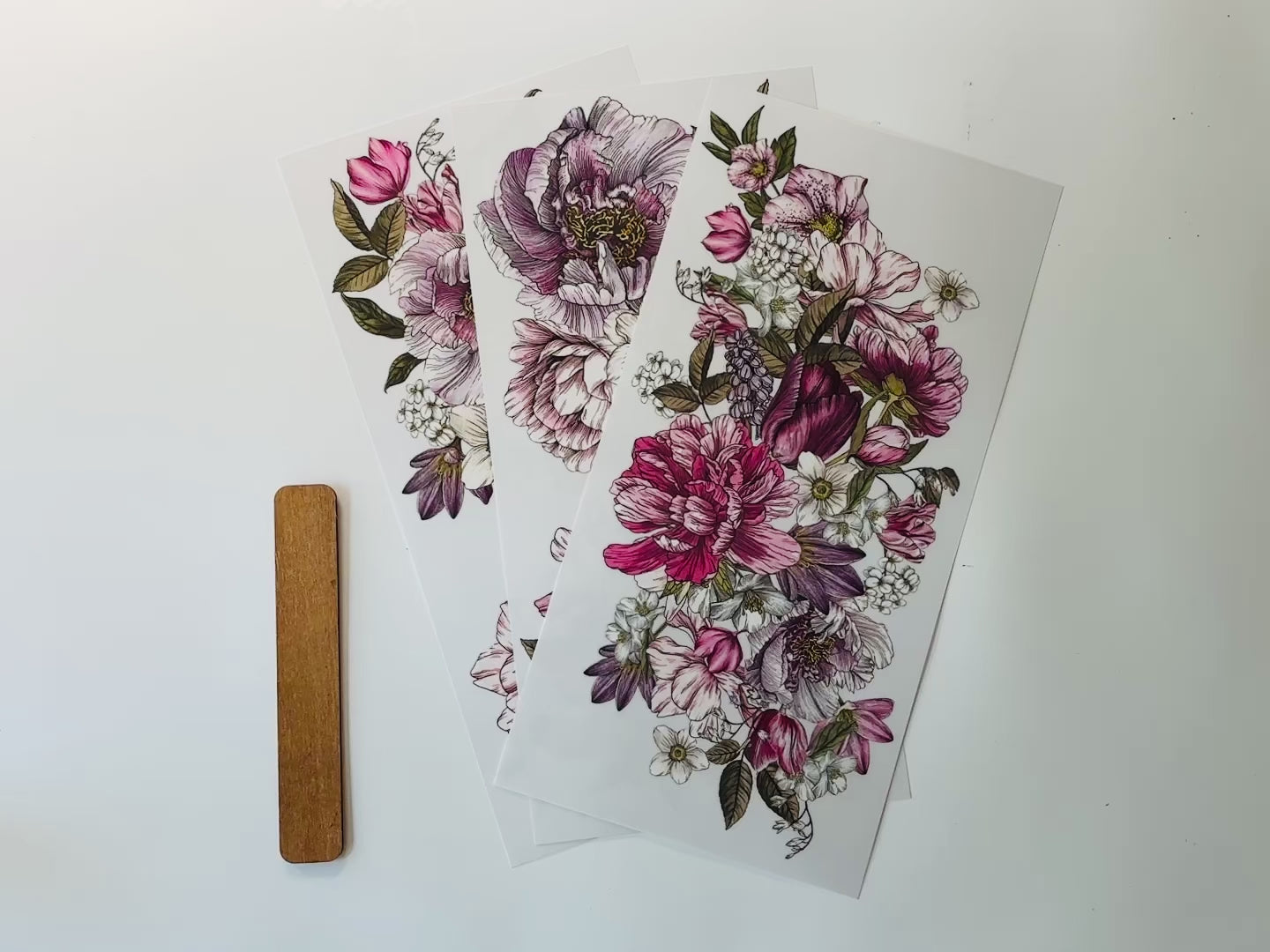 A 15 second video shows a close-up of ReDesign with Prima's Dreamy Florals small rub-on transfer.