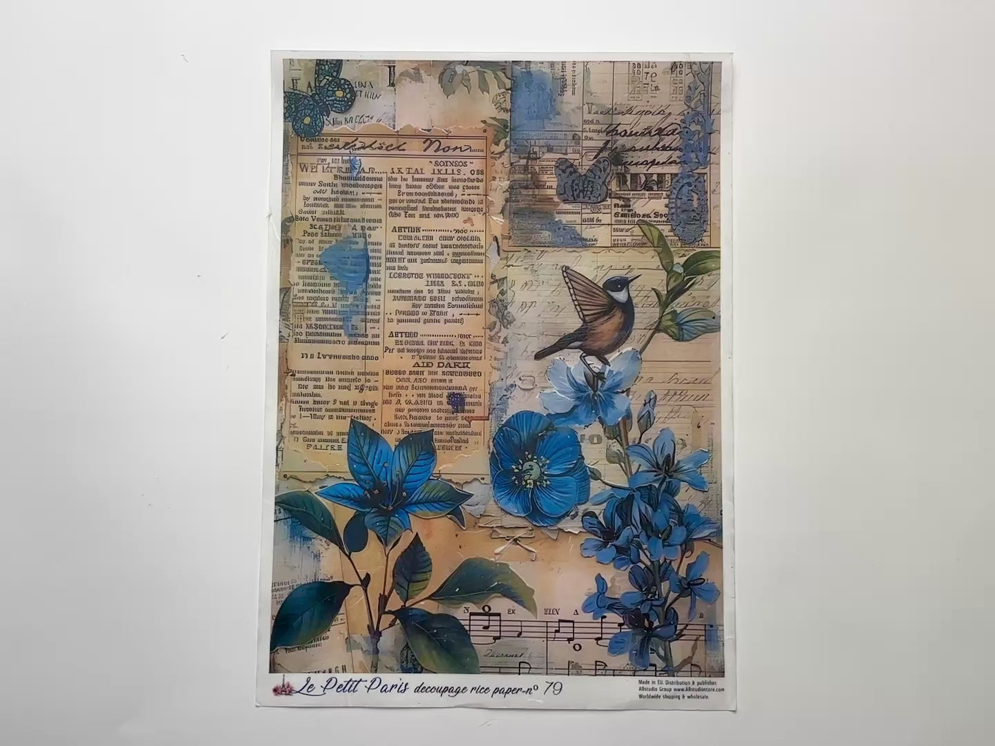 A 14 second video shows a close-up and backside of AB Studio's Blue Paper Collage A4 rice paper against a white background.