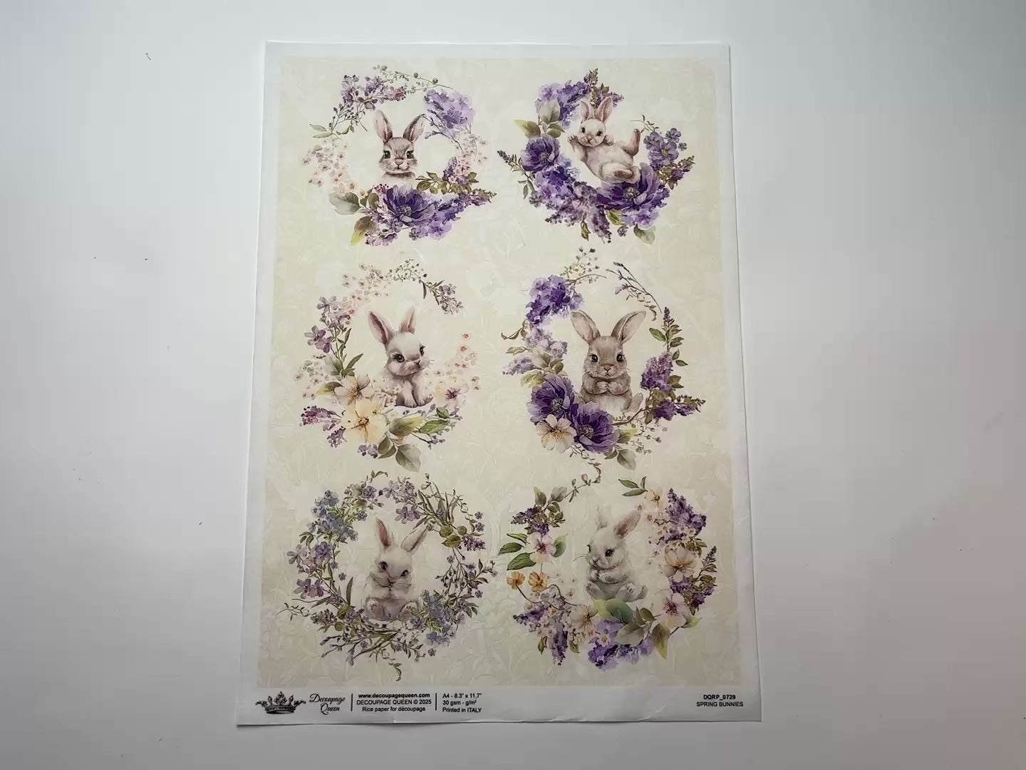 A 15 second video shows a close-up and backside of Decoupage Queen's Spring Bunnies A4 rice paper against a white background.