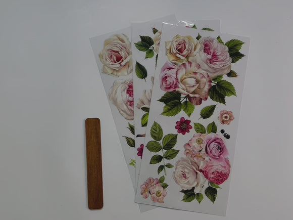 A 15 second video shows a close-up of 3 sheets of ReDesign with Prima's Delicate Roses small rub-on transfer.