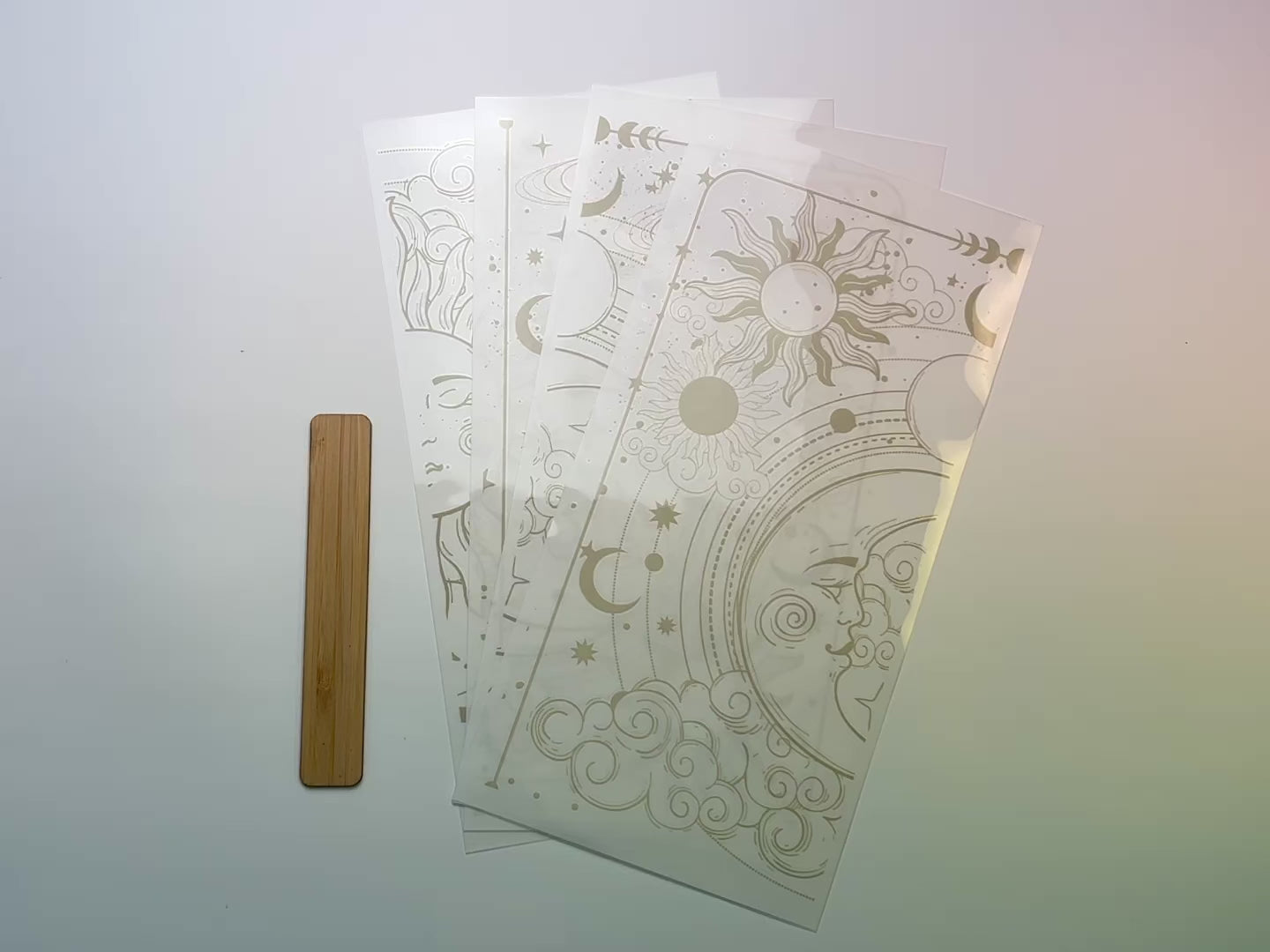 A 14 second video shows a close-up and backside of 4 sheets of Belles & Whistles' Lunar Solstice small rub-on transfers against a white background.