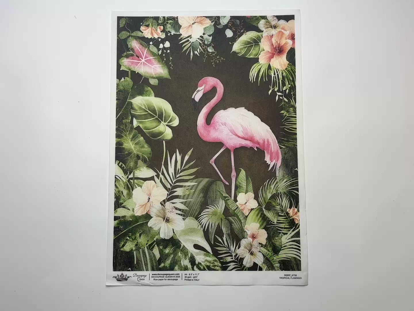 A 13 second video shows a close-up and backside of Decoupage Queen's Tropical Flamingo A4 rice paper against a white background.