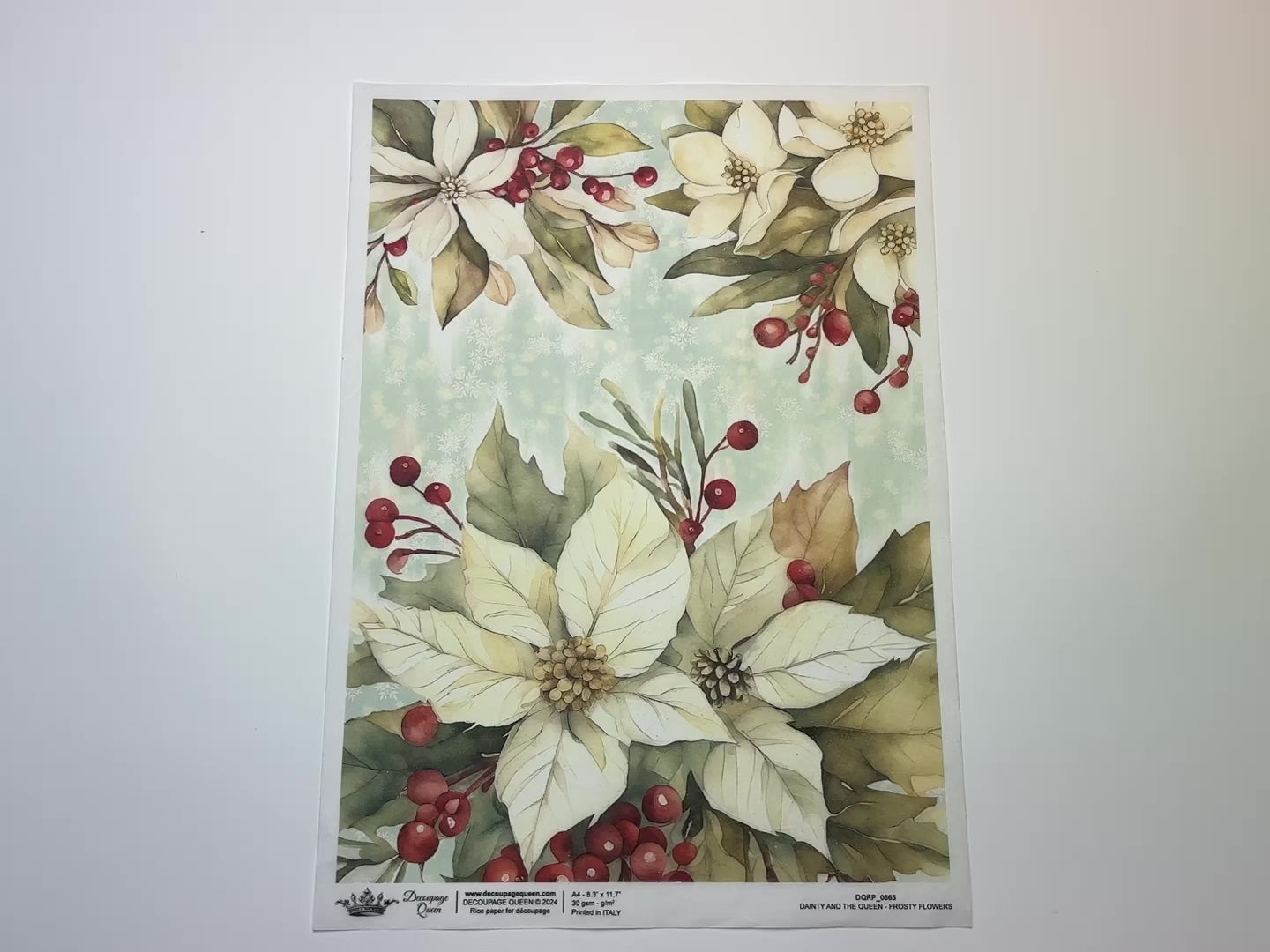 A 14 second video shows a close-up and backside of Decoupage Queen's Frosty Flowers A4 rice paper against a white background.