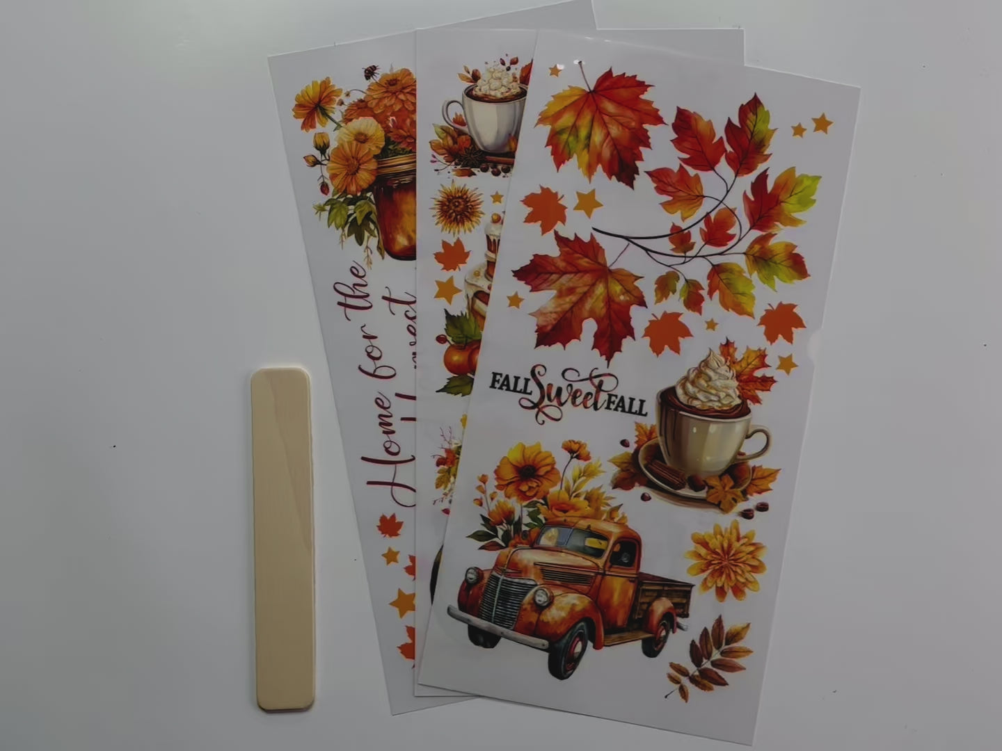 A 14 second video shows a close-up of 3 sheets of ReDesign with Prima's Autumn Splendor small rub-on transfer.