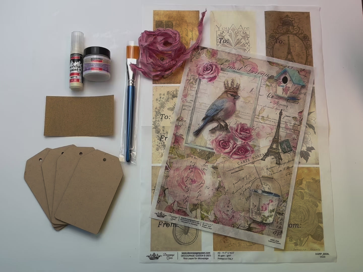 A 15 second video shows close-ups of a beginner's decoupage kit by Decoupage Queen.