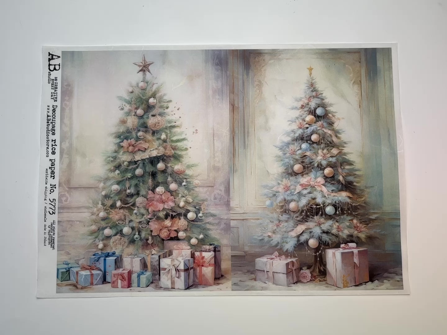 A 15 second video showing a close-up and backside of AB Studio's Christmas Tree 2 Pack A4 rice decoupage paper is against a white background.