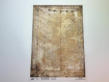 A 15 second video shows a close-up and backside of Decoupage Queen's Warm and Cozy Background A3 rice paper against a white background.