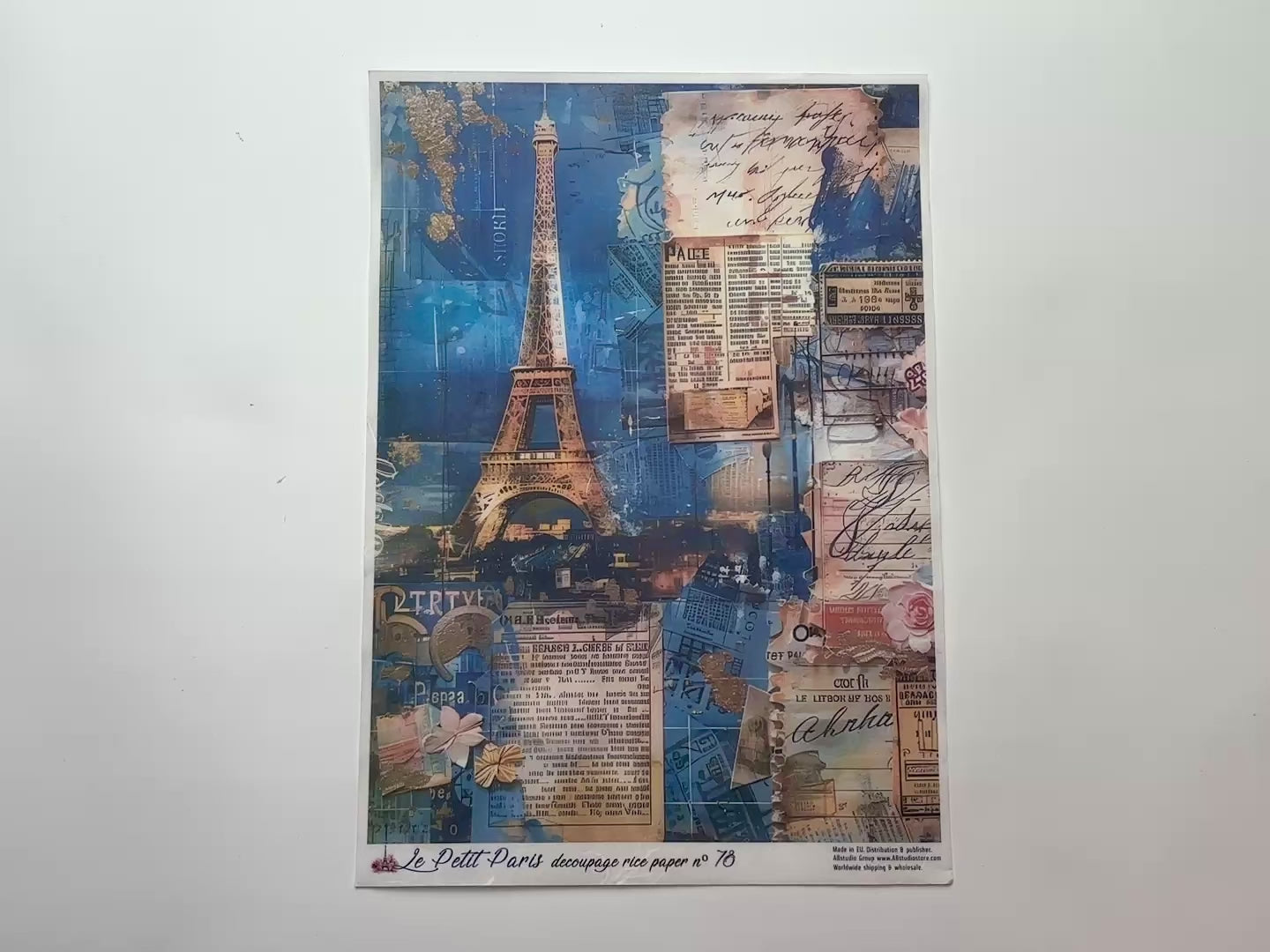 A 14 second video shows a close-up and backside of AB Studio's Blue Parisian Collage A4 rice paper against a white background.