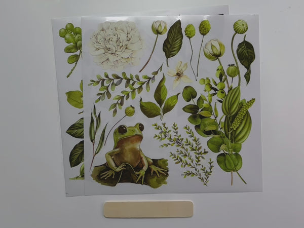 A 15 second video shows a close-up of ReDesign with Prima's Froggy Meadow Greens 12" x 12" small transfer.