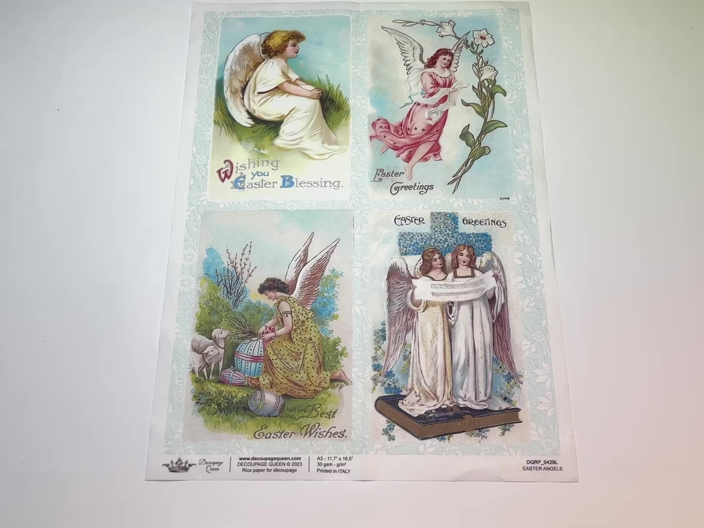 A 15 second video of a close-up and backside of Decoupage Queen's Easter Angels A3 rice paper is against a white background.