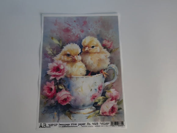 A 12 second video shows a close-up and hand lifting AB Studio's Easter Baby Chicks in a Teacup A4 rice paper against a white background.